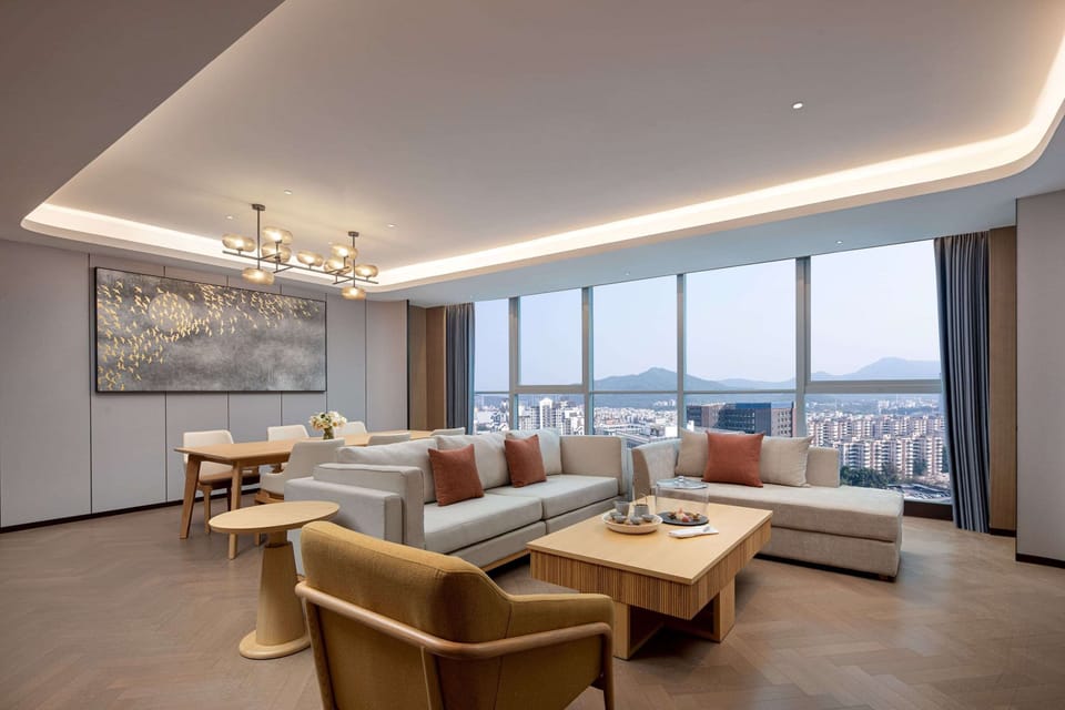 Deluxe Suite, Multiple Beds, Smoking (Premium) | Minibar, in-room safe, blackout drapes, iron/ironing board