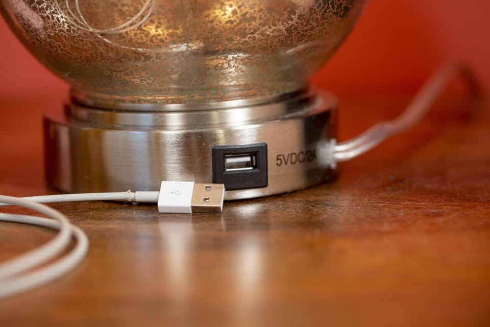 USB ports in the lamps to easily charge your phone.