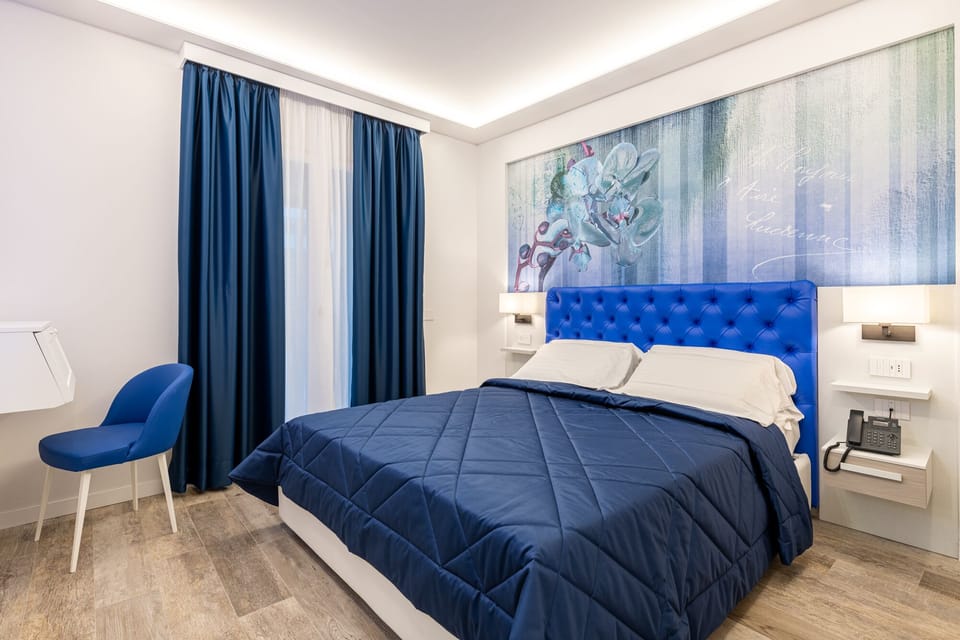 Comfort Room | Premium bedding, down comforters, minibar, in-room safe