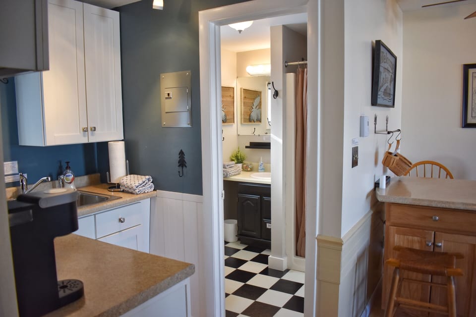 Bathroom right off the kitchen - everything is close and convenient!