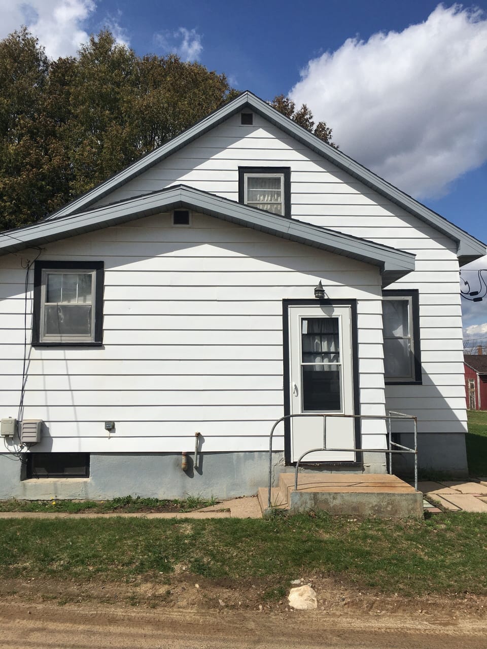 Side entrance with push code entry.