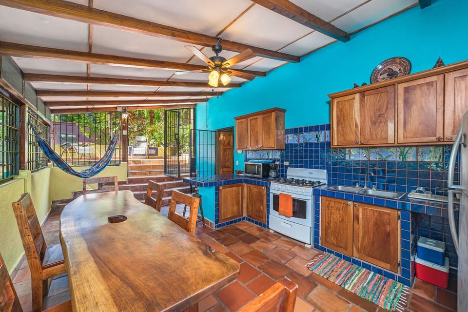 Open air kitchen and dining area.