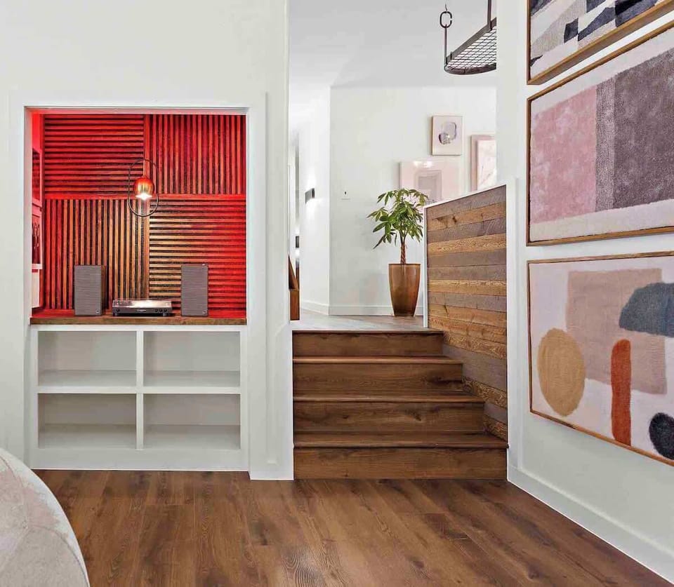 Multilevel living spaces and a vintage entertainment nook complete with record player and speakers.