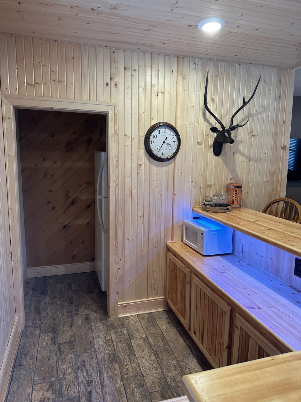 Refrigerator for bar area behind wall