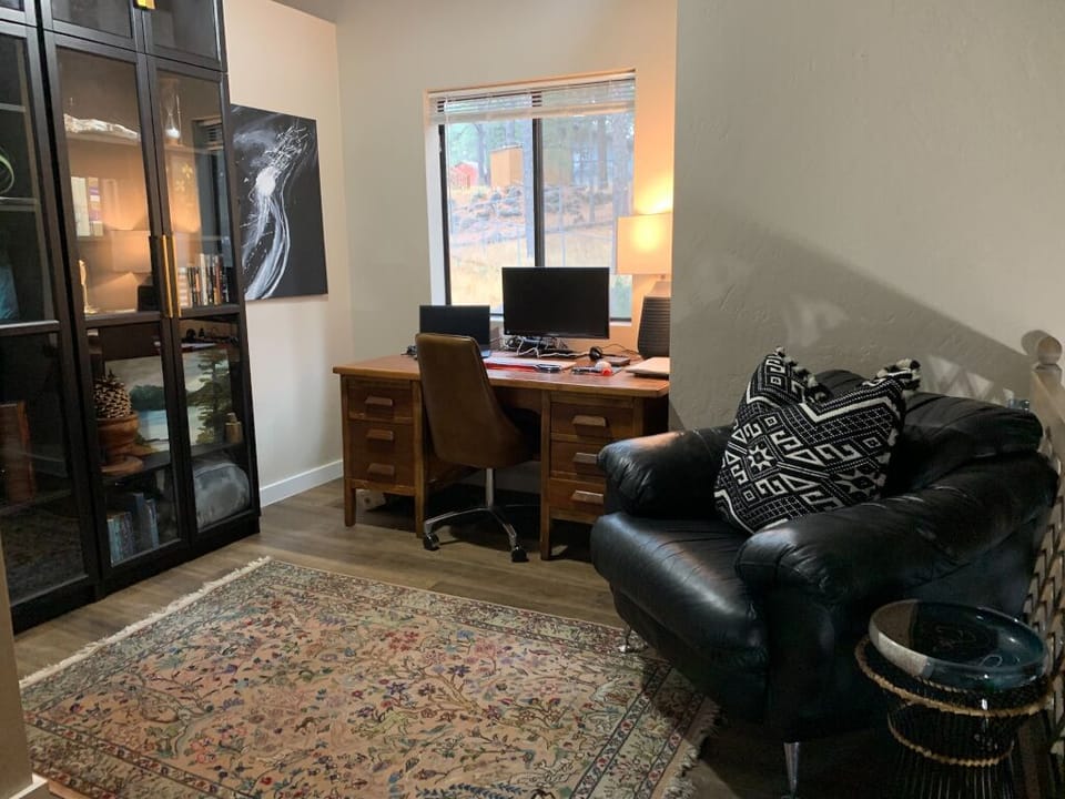 Office space in the loft. Perfect for remote work if you need to. Gig Internet