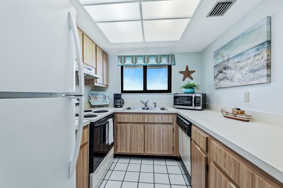 The fully equipped kitchen is ready to handle all your culinary needs, making it easy to prepare homemade meals.