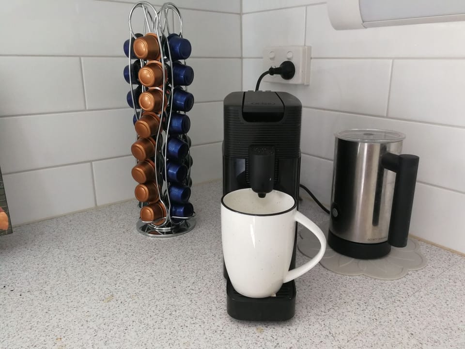 Pod coffee maker with complementary pods.