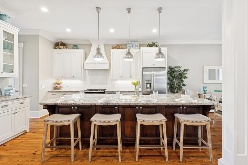 4 barstools in the kitchen.