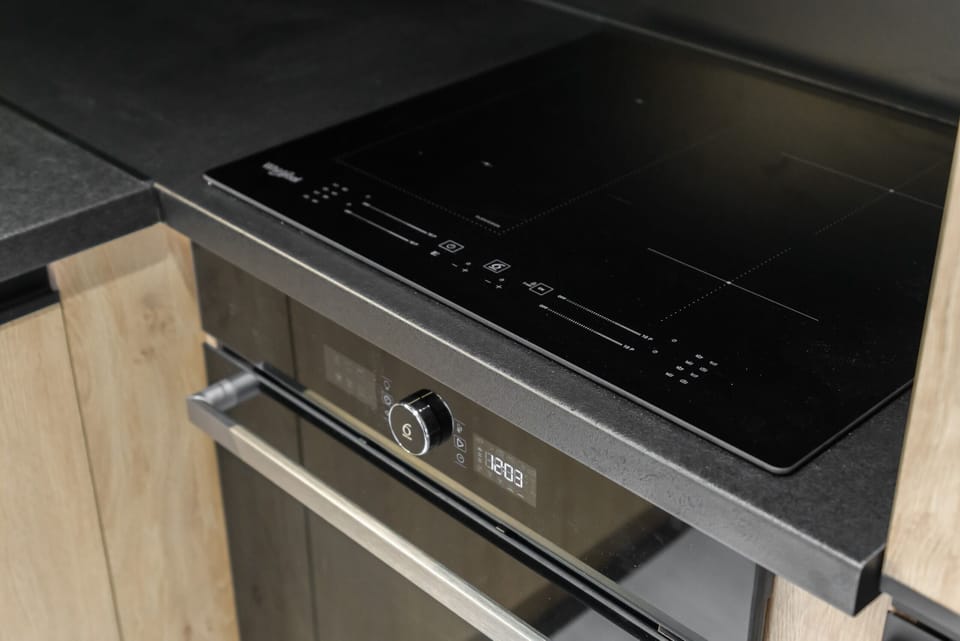 A close-up of a built-in stovetop in the kitchen.

