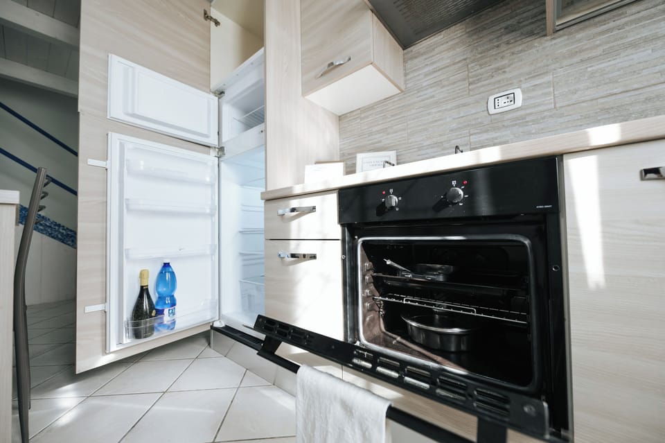 Deluxe Apartment | Private kitchen | Espresso maker, coffee/tea maker, electric kettle
