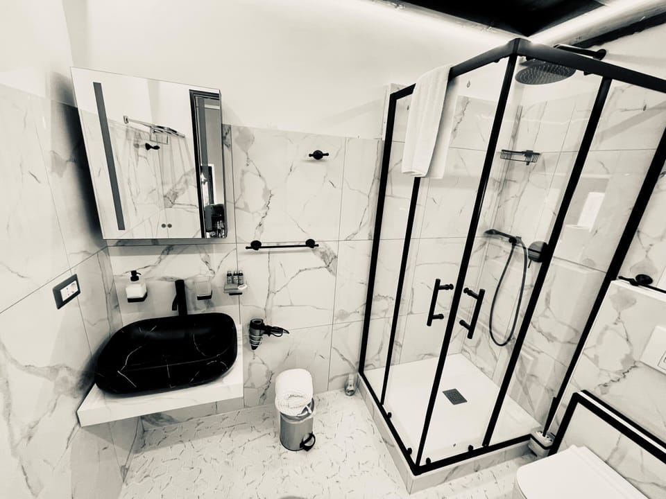 Junior Loft | Bathroom | Shower, rainfall showerhead, hair dryer, bathrobes