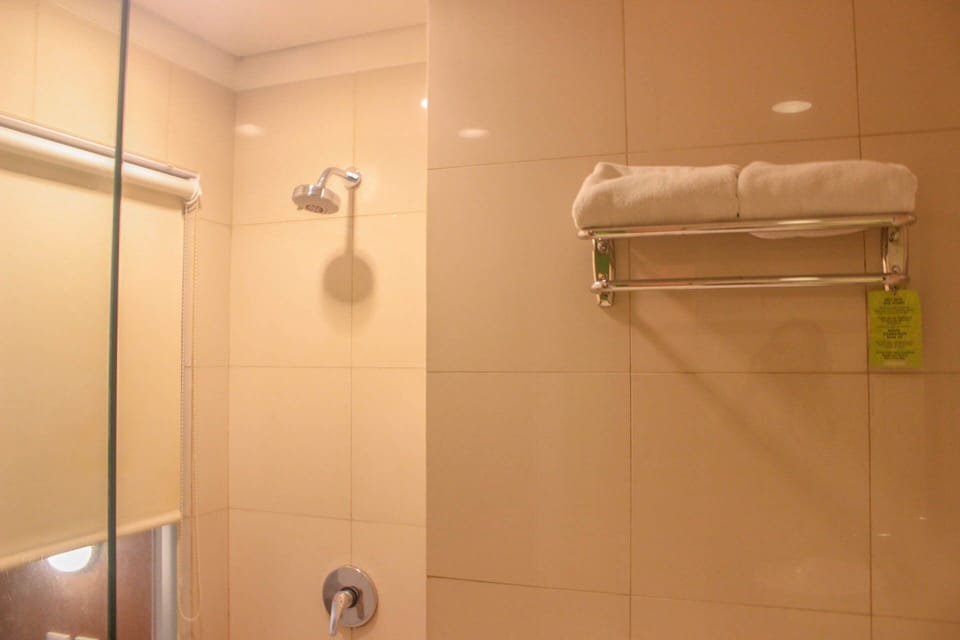 Shower, free toiletries, hair dryer, slippers