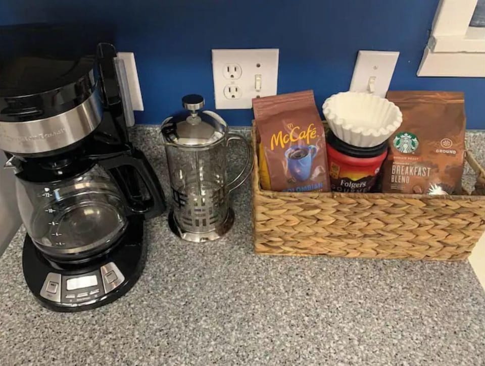 Drip coffee maker with filters provided and French press too.  