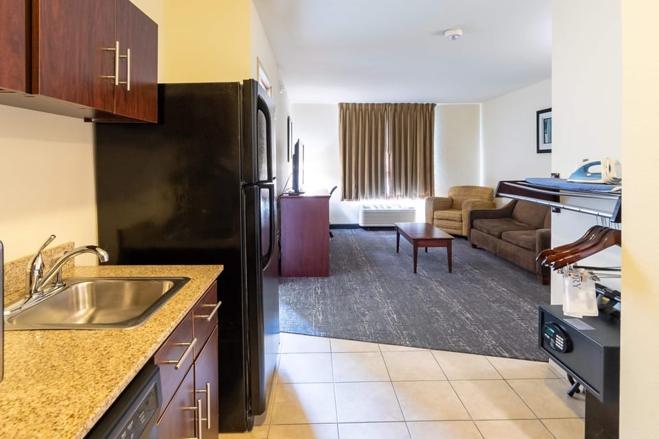 Suite, 1 King Bed with Sofa bed, Accessible, Non Smoking (Roll-in Shower) | Premium bedding, down comforters, pillowtop beds, desk