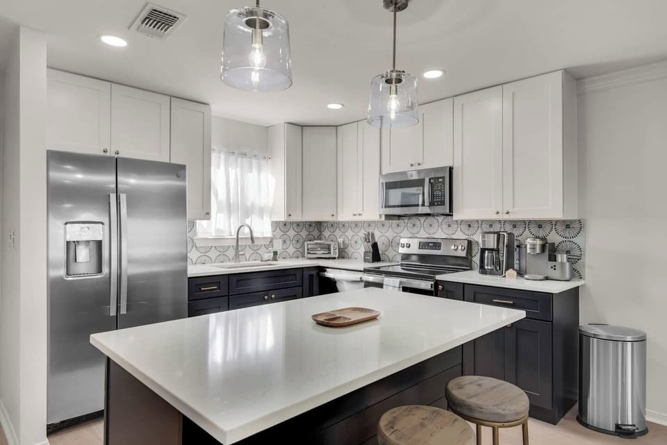 Kitchen features full size stainless steel appliances and Keurig K-Cafe, Coffee Pot, Toaster Oven, Griddle and Blender.  Refrigerator has ice maker and water dispenser. 