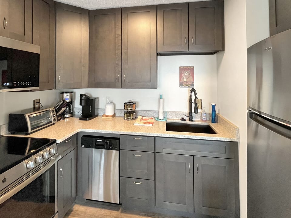 Enjoy the fully stocked kitchen, Fridge, Keurig, coffee maker, microwave
