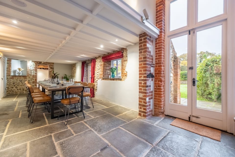 Ground floor main barn: Wonderful dining table with seating for up to fourteen