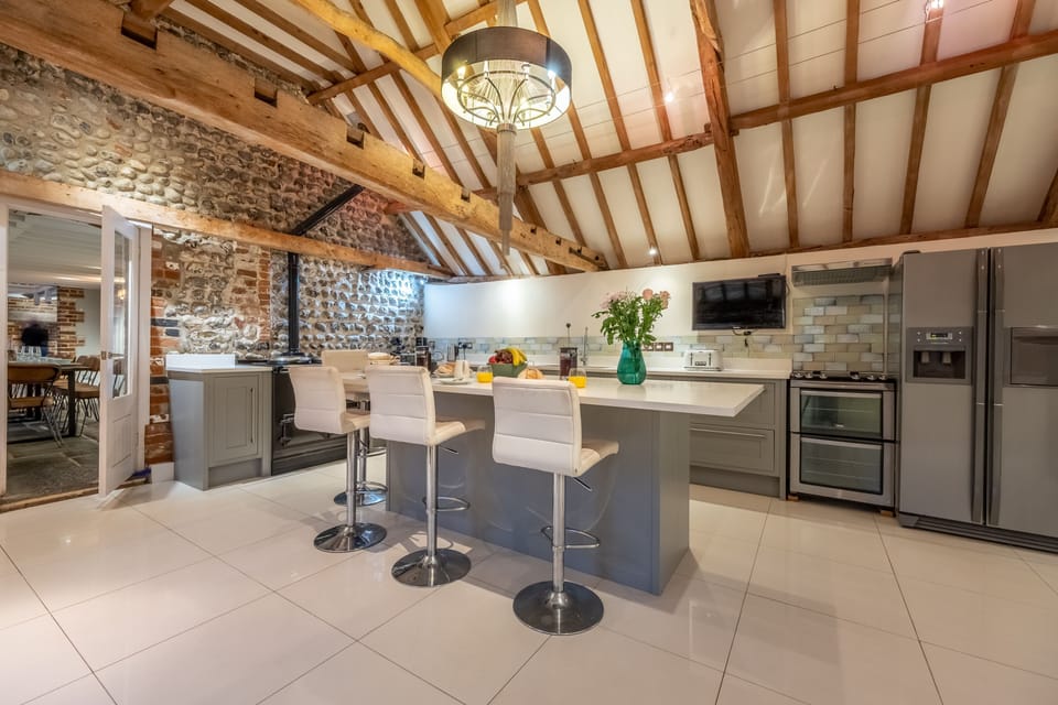 Ground floor main barn: The kitchen has Aga and integrated oven