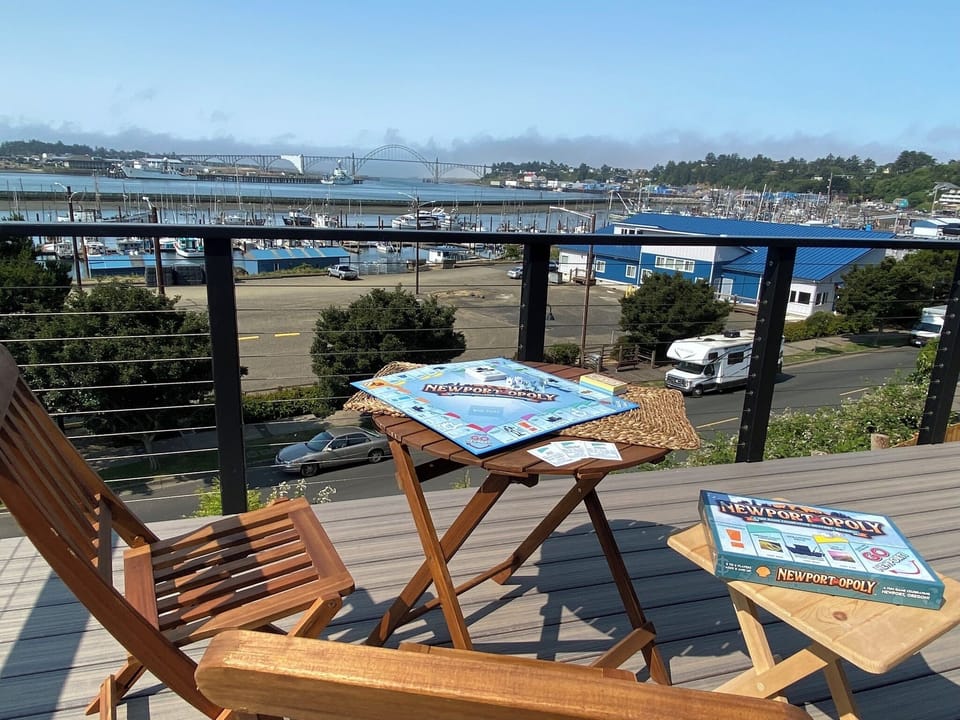 Enjoy lunch or a board game on a deck with a harbor view.