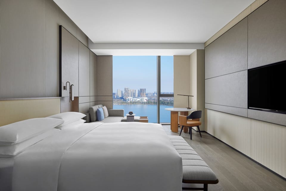 Premium bedding, down comforters, minibar, in-room safe