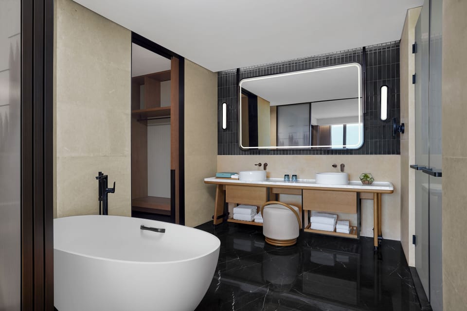 Separate tub and shower, deep soaking tub, rainfall showerhead
