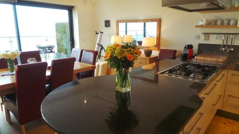 Large granite work surfaces to help prepare lunch.
