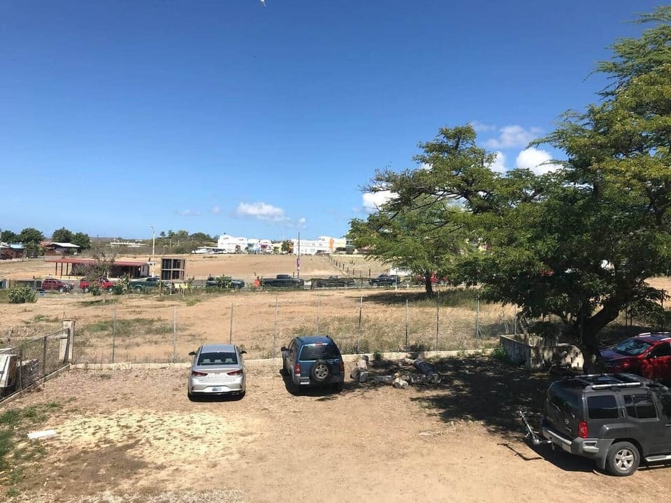 Parking lot inside property.