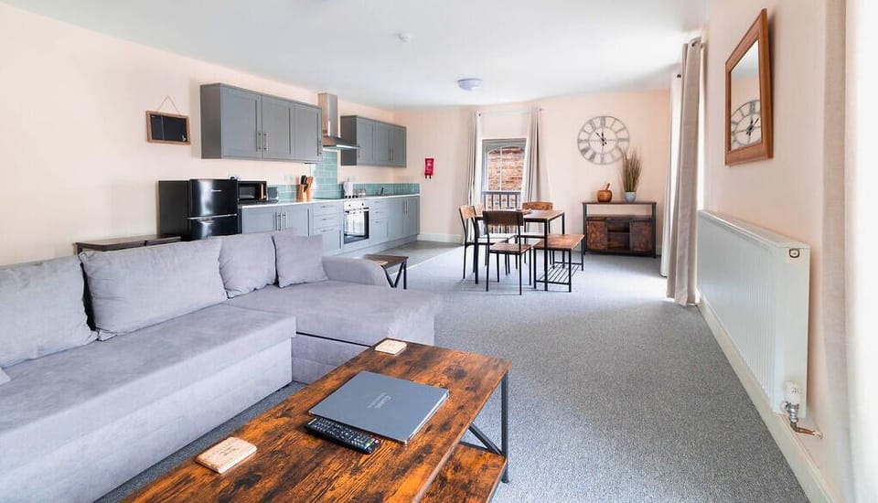 Apartment, 2 Bedrooms | Living area | 28-inch LCD TV with digital channels, TV