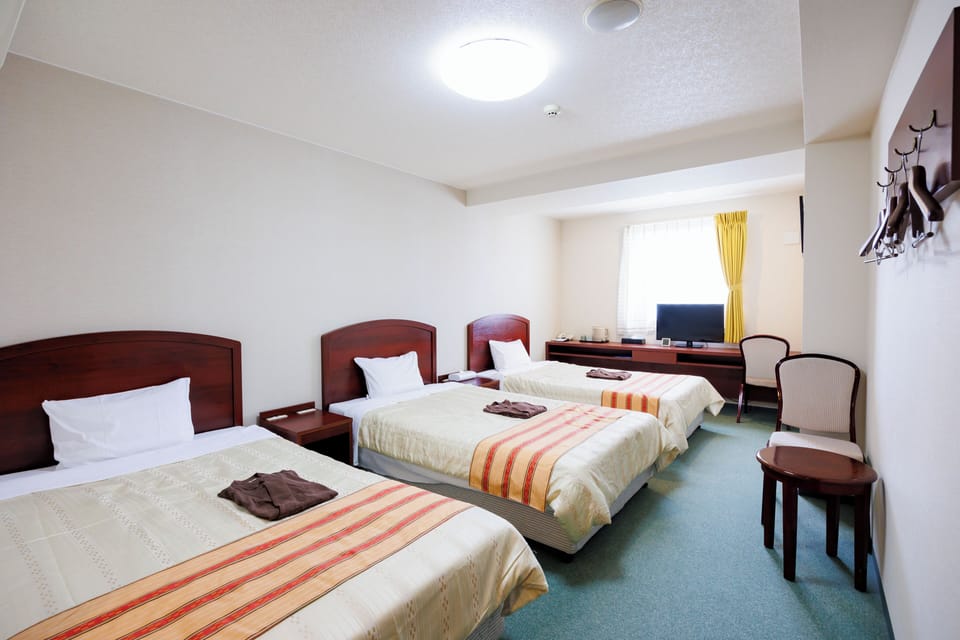 Triple Room, Non Smoking | Free WiFi, bed sheets