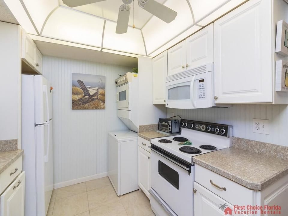Anastasia Condos 104 Kitchen with Stove