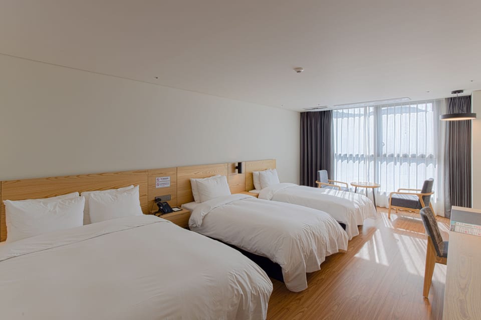 Premium Triple Room | Desk, laptop workspace, free WiFi, bed sheets