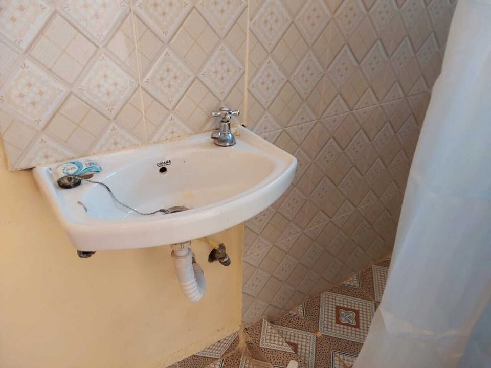 Slippers, towels, soap, toilet paper