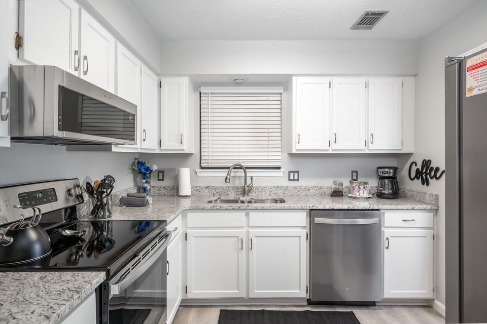 New appliances, granite countertops, lots of cooking  utensils. LED lighting.