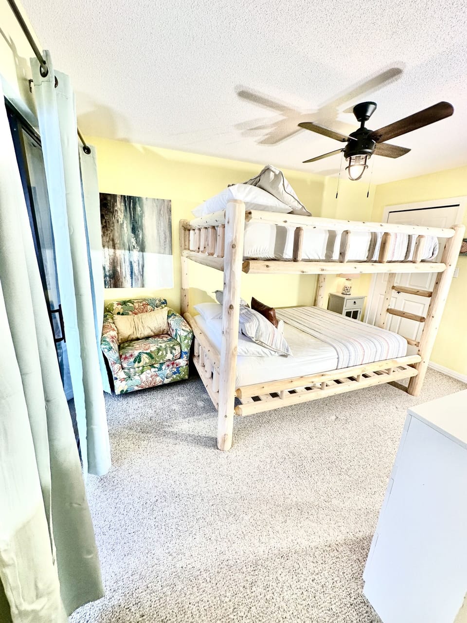 Two Queen beds & private bathroom with access to top deck with ocean views! 