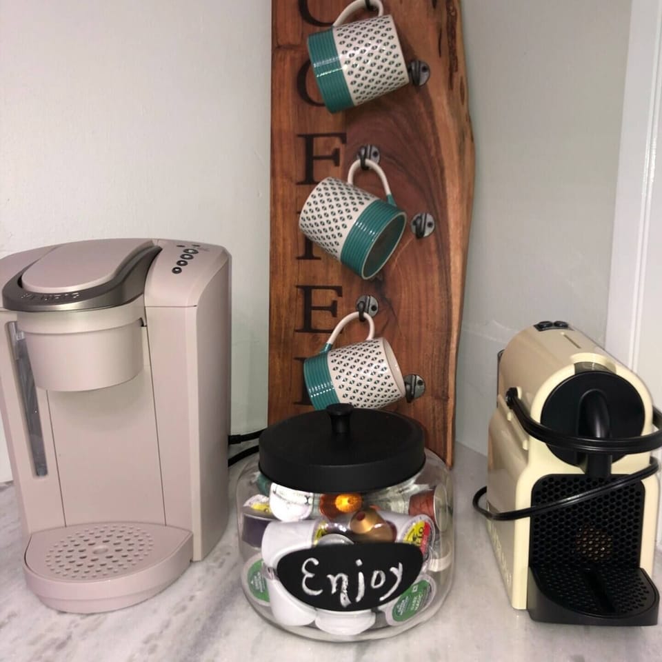 Keurig and Nespresso Coffee station with an assortment of roasts.  Half & Half & various sweeteners also provided