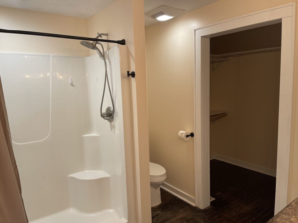 walk in shower and walk in closet in master bath