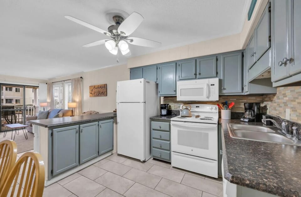 Front entry into kitchen and living room
