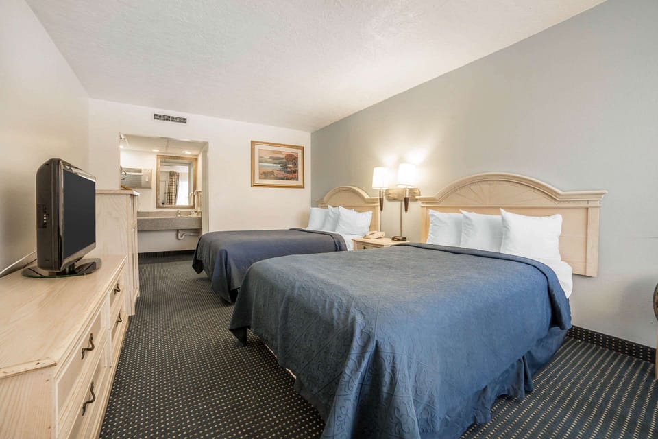 Standard Room, 2 Double Beds, Non Smoking | Blackout drapes, iron/ironing board, free WiFi, bed sheets