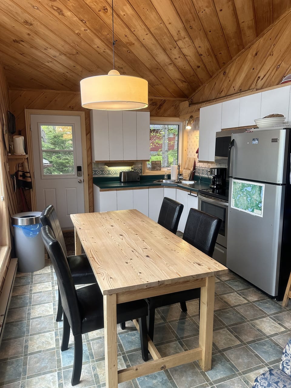Kitchen view, main entrance door.