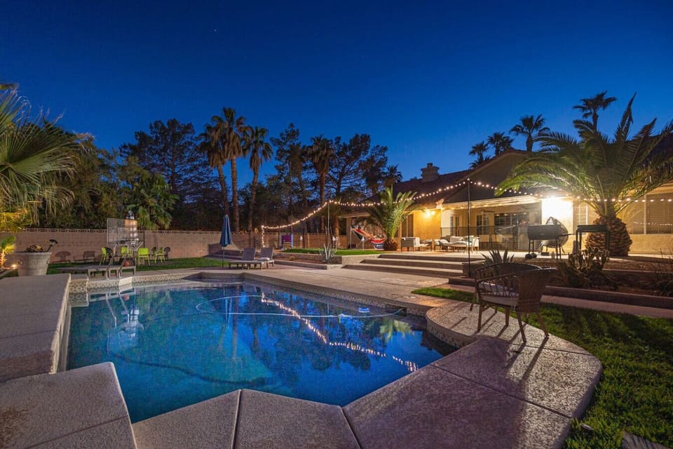Walk down the steps from the home to the gorgeous pool, firepit, or hot tub in a very private setting.