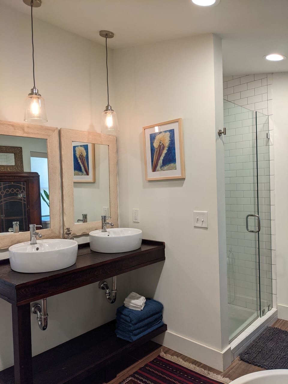 Primary bathroom with double sinks and vanities