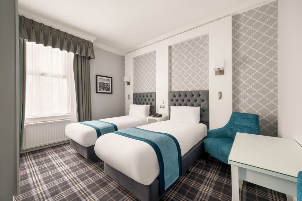 Carlton Classic Twin Room (Separate Building) | Desk, laptop workspace, iron/ironing board, free WiFi