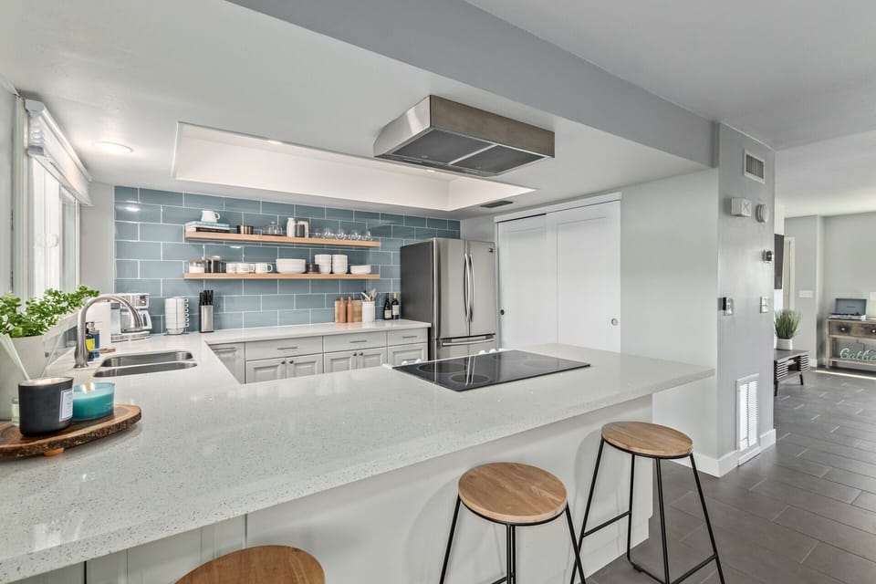 Spacious Kitchen with additional barstool seating.
