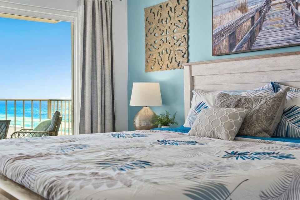 Primary bedroom with private bath and gorgeous views of the beach!