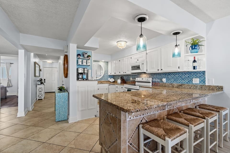Kitchen view, looking toward entryway hall.