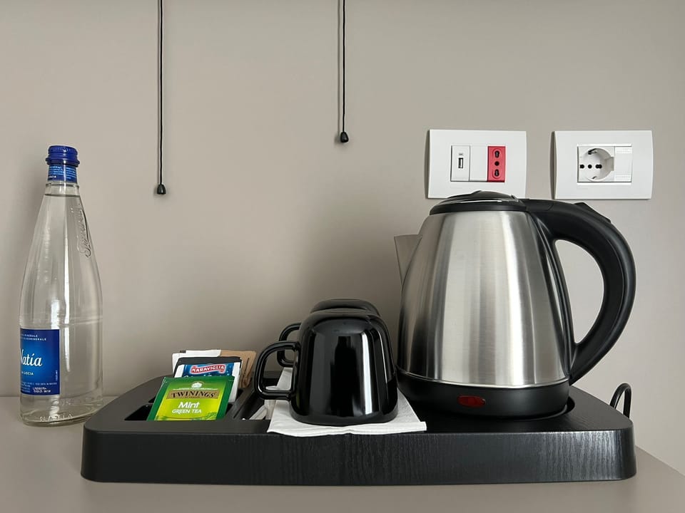 Premium bedding, down comforters, minibar, in-room safe