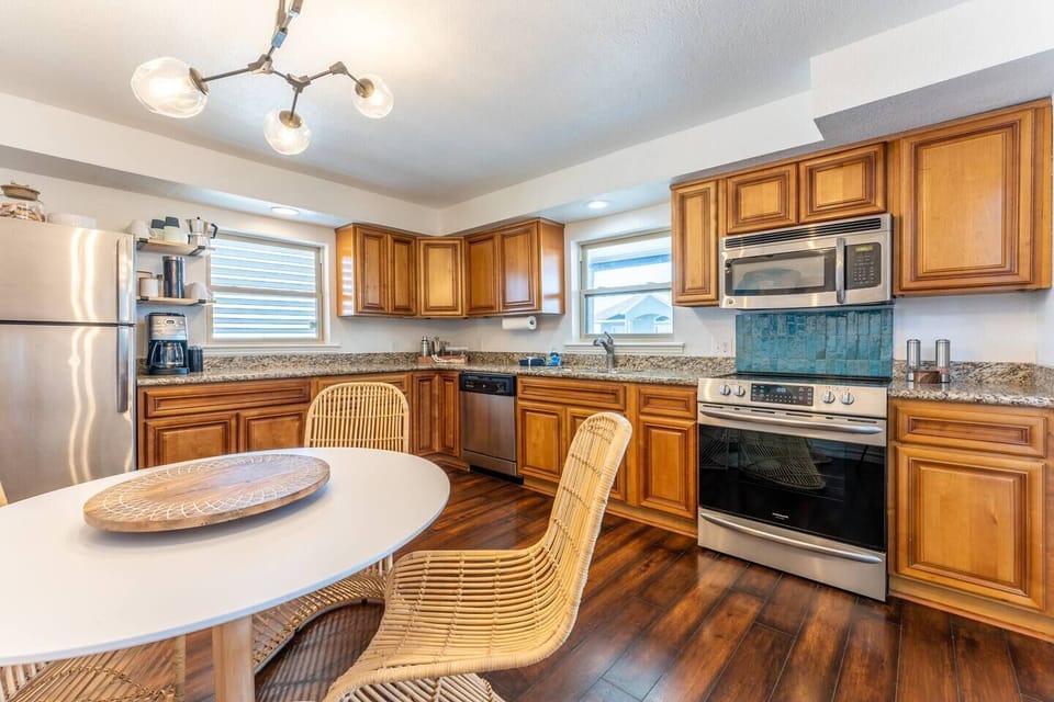 Spacious kitchen with stylish breakfast table for four.