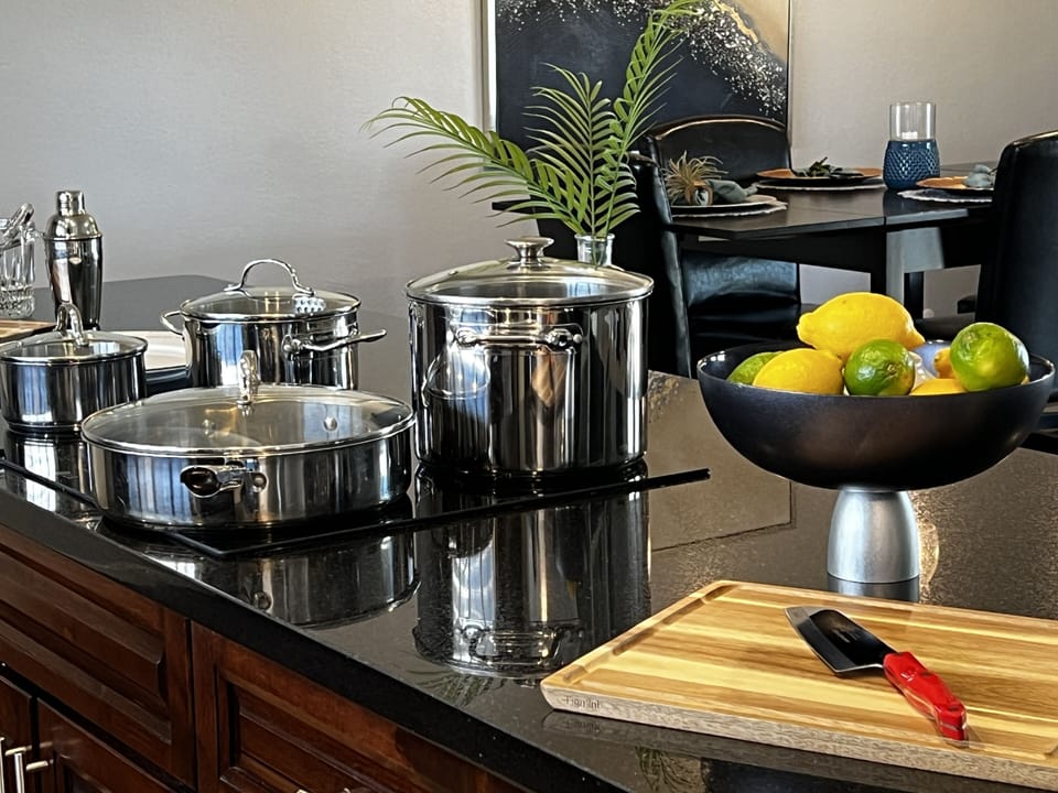Kitchen: Quality cookware and dine around 12' island that opens to great room