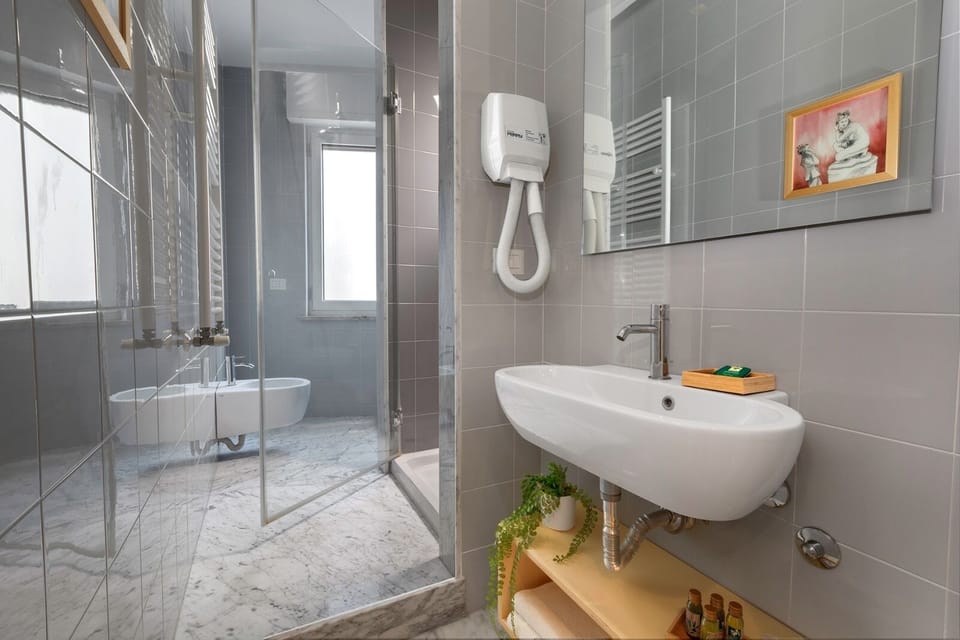 Comfort Double Room, 1 Queen Bed, Non Smoking, Balcony (bagno privato esterno) | Bathroom | Shower, free toiletries, hair dryer, bidet
