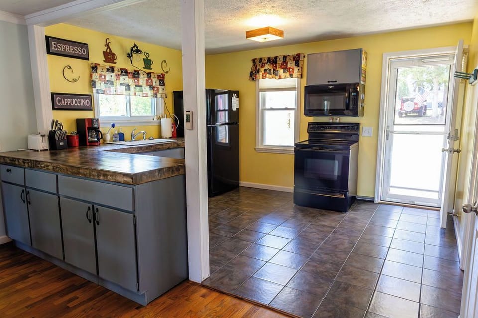 Upper level Kitchen with dishwasher and garbage disposal